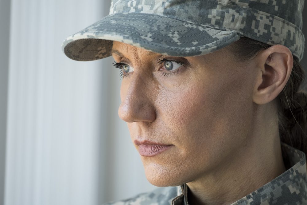 military woman looks worried